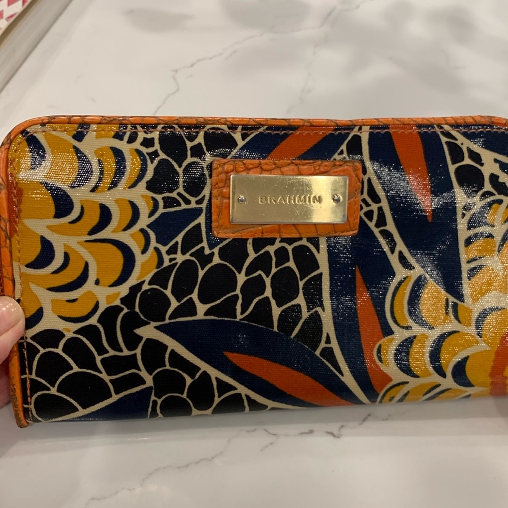 Brahmin zip around wallet.  Beautiful colors.